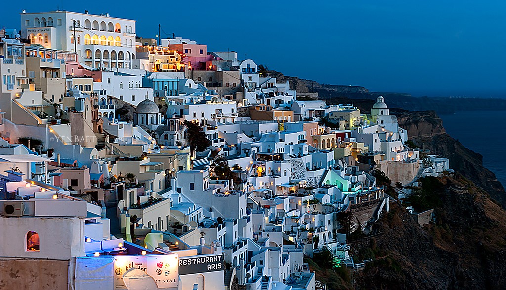 ⁠Fira town cobblestone streets and Cycladic architecture near Vourvoulos Santorini⁠